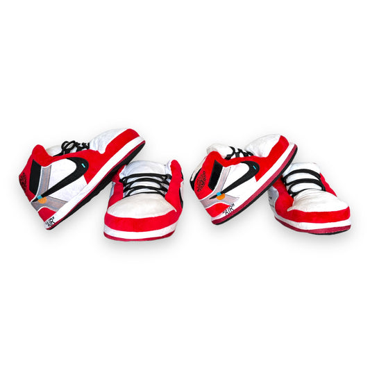 OG AIR Sneaker Slippers – red, black and white plush sneaker-style slippers for adults and kids with soft foam soles on white background.